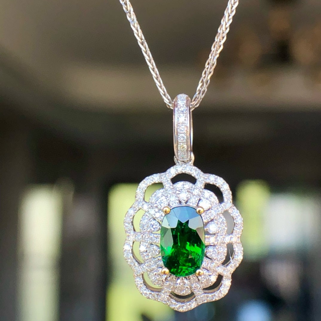 14k Gold 1.39 Ctw Vivid Green Natural Tsavorite & Diamond Pendant( Without Chain ): Ref:230955213 // gold content:14k gold // main gemstone:tsavorite // shape:oval // carat weight:1ct // color:vivid green // treatment:natural // // adjacent gemstone 2 : diamond // shape:round //