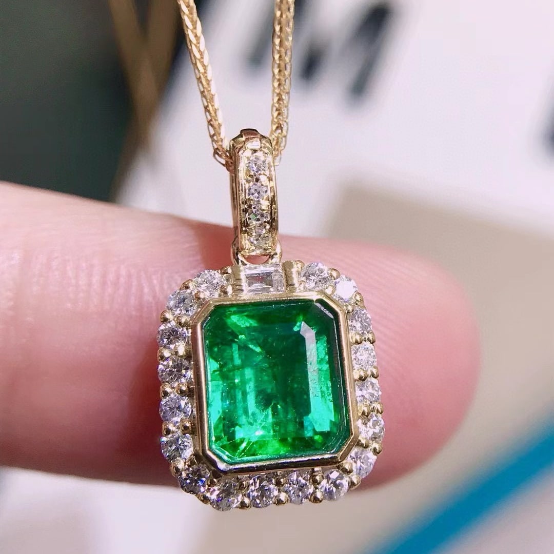 14k Gold 1.1 Ct Vivid Green Natural Emerald & Diamond Pendant( Without Chain ): Ref:230955237 // gold content:14k gold // main gemstone:emerald // shape:octagonal // carat weight:1. 1ct // color:vivid green // treatment:natural // // adjacent gemstone 2 : diamond // number of sto