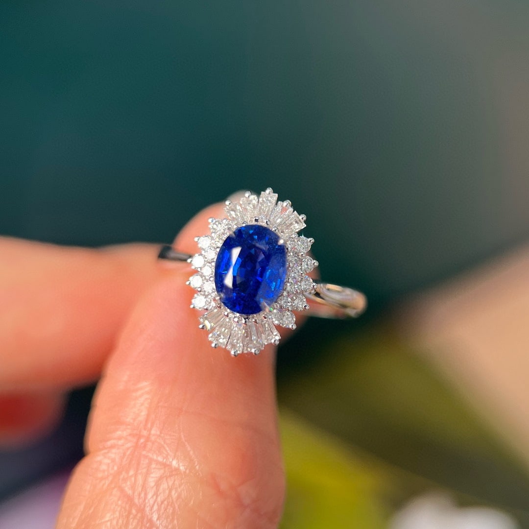 14k Gold 2.47 Ctw Vivid Blue Natural Sapphire & Diamond Ring: Ref:230955250 // gold content:14k gold // ring size:7. 25us // // main gemstone:sapphire // shape:oval // carat weight:1. 87ct // color:vivid blue // treatment:natural // // adjacent gemstone 2 :