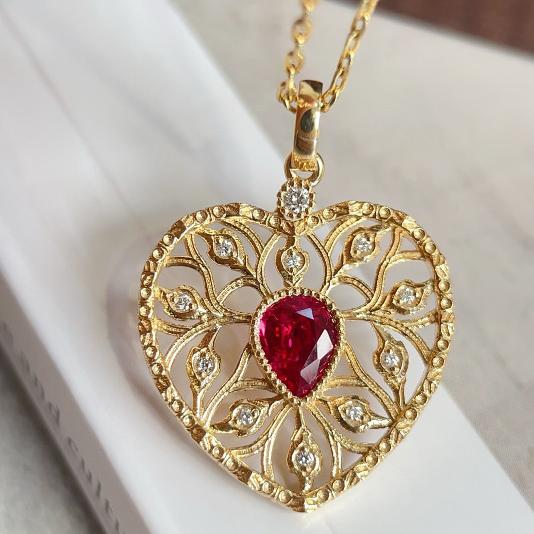 14k Gold 0.58 Ctw Natural Ruby & Diamond Pendant( Without Chain ): Ref:230956095 // gold content:14k gold // main gemstone:ruby // shape:pear // carat weight:0. 51ct // color:pigeonblood red // treatment:natural // // adjacent gemstone 2 : diamond // shape:round // c