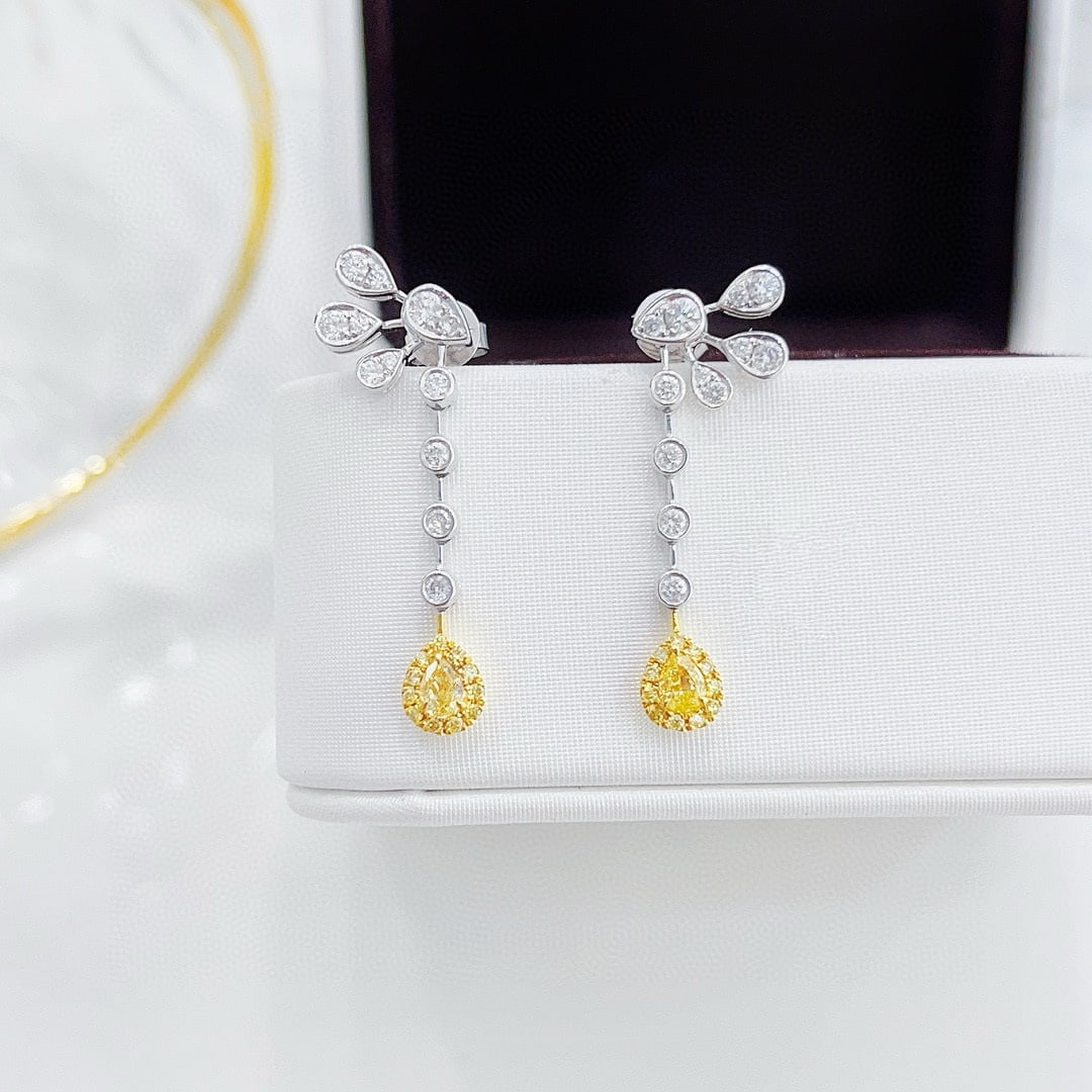 14k Gold 0.68 Ctw Natural Yellow Diamond & Diamond Earrings: Ref:230956242 // gold content:14k gold // main gemstone:yellow diamond // shape:pear // carat weight:0. 22ct // color:yellow // treatment:natural // // adjacent gemstone 2 : diamond // shape:round //