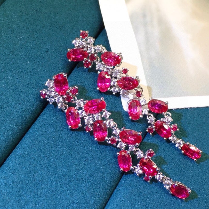 14k Gold 5.58 Ctw Natural Ruby & Sapphire Earrings: Ref:230956341 // gold content:14k gold // main gemstone:ruby // shape:oval // carat weight:4. 85ct // color:red // treatment:natural // // adjacent gemstone 2 : sapphire // shape:round // carat