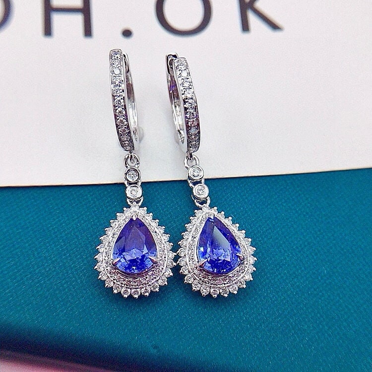 14k Gold 2.26 Ctw Natural Sapphire & Diamond Earrings: Ref:230956351 // gold content:14k gold // main gemstone:sapphire // shape:pear // carat weight:1. 73ct // color:blue // treatment:natural // // adjacent gemstone 2 : diamond // shape:round // carat