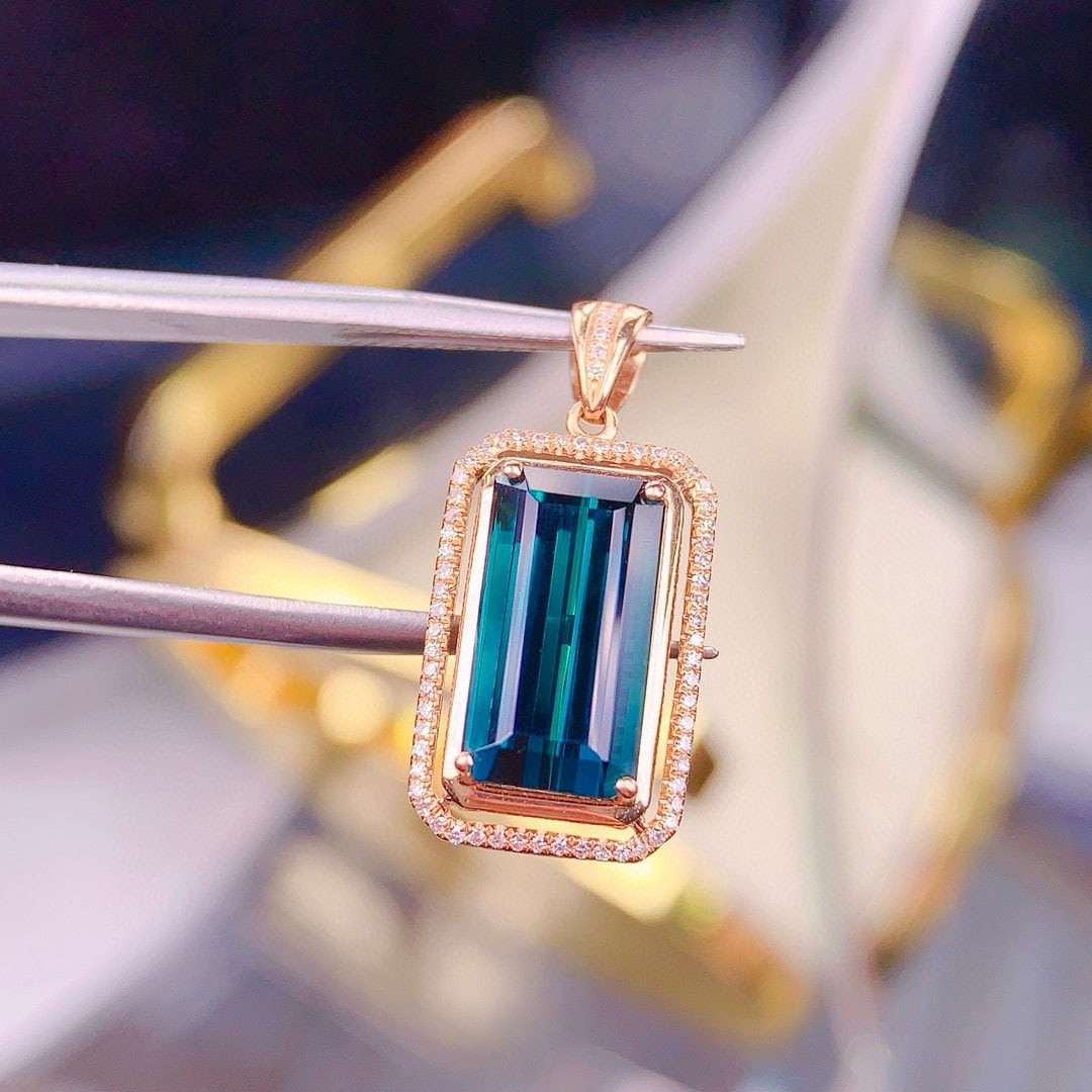 14k Gold 4.8 Ct Natural Tourmaline & Diamond Pendant( Without Chain ): Ref:230956416 // gold content:14k gold // main gemstone:tourmaline // shape:octagonal // carat weight:4. 8ct // color:blue // treatment:natural // // adjacent gemstone 2 : diamond // shape:round //