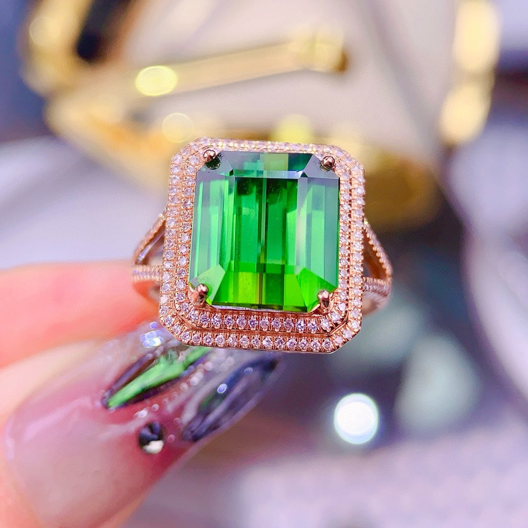 14k Gold 7.02 Ct Natural Tourmaline & Diamond Ring: Ref:230956420 // gold content:14k gold // ring size:7. 25us // // main gemstone:tourmaline // shape:octagonal // carat weight:7. 02ct // color:green // treatment:natural // // adjacent gemstone 2