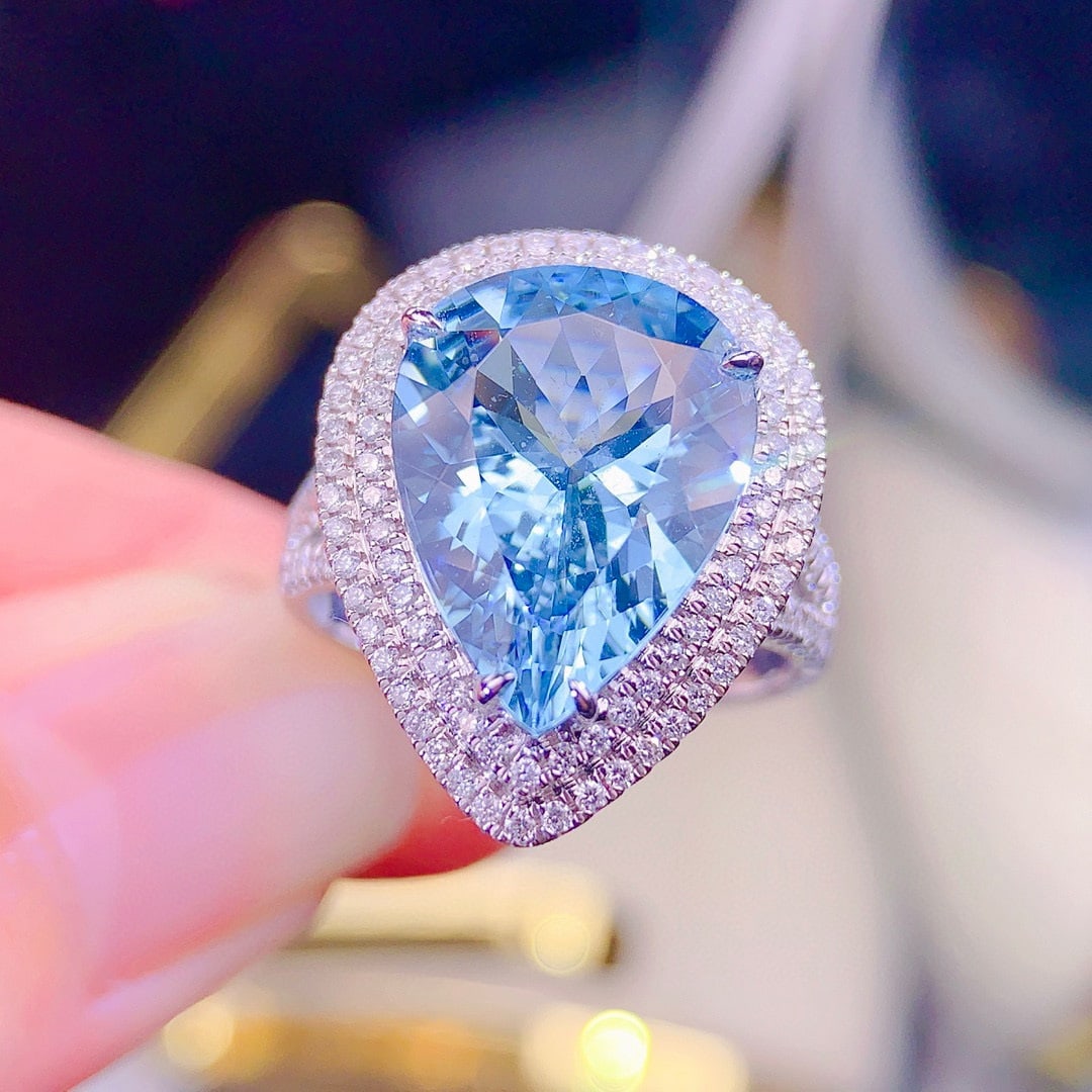 14k Gold 4.6 Ct Natural Aquamarine & Diamond Ring: Ref:230956421 // gold content:14k gold // ring size:7. 25us // // main gemstone:aquamarine // shape:pear // carat weight:4. 6ct // color:blue // treatment:natural // // adjacent gemstone 2 :