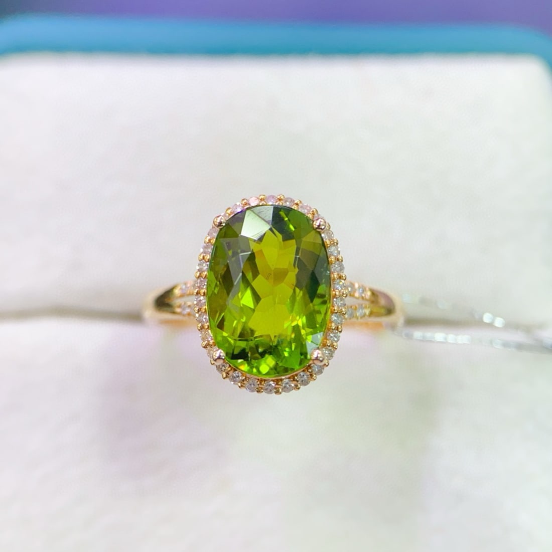 14k Gold 4.03 Ctw Natural Tourmaline & Diamond Ring: Ref:230957005 // gold content:14k gold // ring size:7. 25us // // main gemstone:tourmaline // shape:oval // carat weight:3. 85ct // color:green // treatment:natural // // adjacent gemstone 2 : diamond