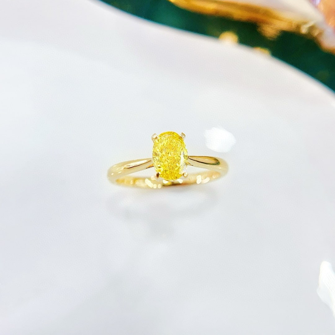 14k Gold 0.81 Ct Lab Grown Diamond Ring: Ref:230957028 // gold content:14k gold // ring size:7. 25us // // main gemstone:lab grown diamond // shape:oval // carat weight:0. 81ct // color:yellow // Condition: NewLow Estimate: 4800.00High