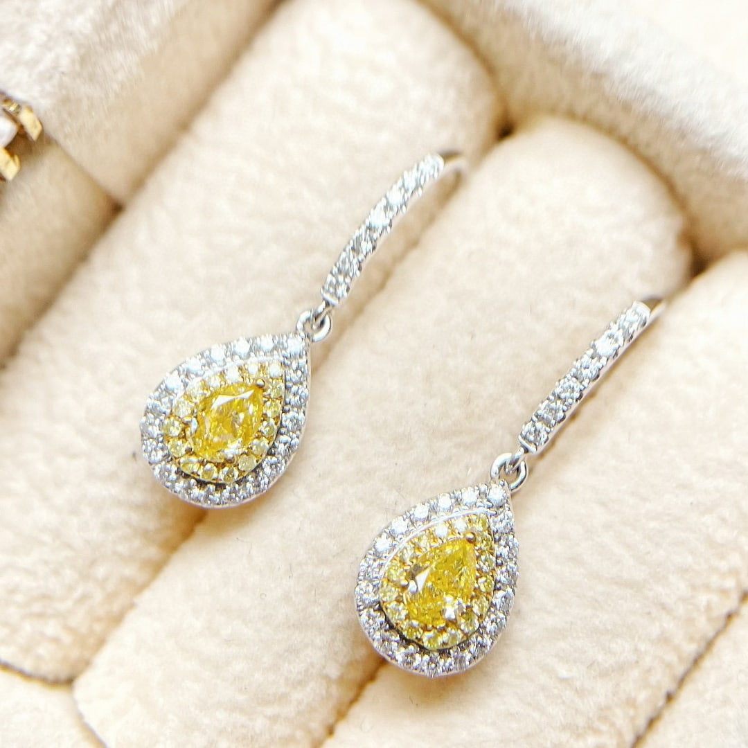 14k Gold 0.80 Ctw Natural Yellow Diamond & Diamond Earrings: Ref:230957164 // gold content:14k gold // main gemstone:yellow diamond // shape:pear // carat weight:0. 45ct // color:yellow // treatment:natural // // adjacent gemstone 2 : diamond // shape:round //