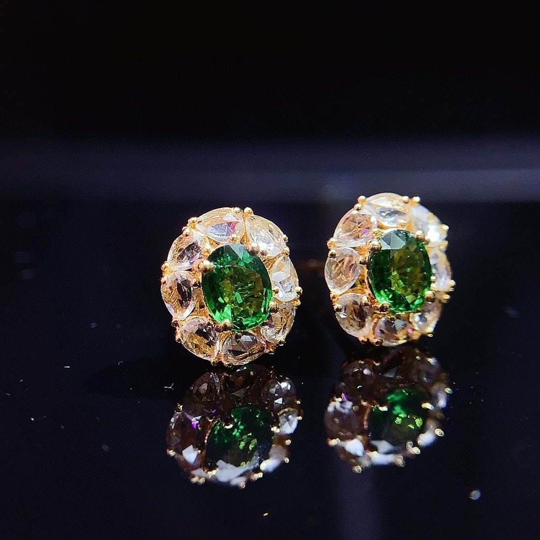 14k Gold 1.00 Ct Natural Tsavorite & Sapphire Earrings: Ref:230957180 // gold content:14k gold // main gemstone:tsavorite // shape:oval // carat weight:1. 00ct // color:green // treatment:natural // // adjacent gemstone 2 : sapphire // number of