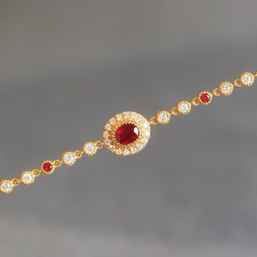 14k Gold 0.87 Ctw Natural Ruby & Diamond Bracelet: Ref:230957210 // gold content:14k gold // main gemstone:ruby // shape:oval // carat weight:0. 50ct // color:pigeonblood red // treatment:natural // // adjacent gemstone 2 : diamond // shape:round