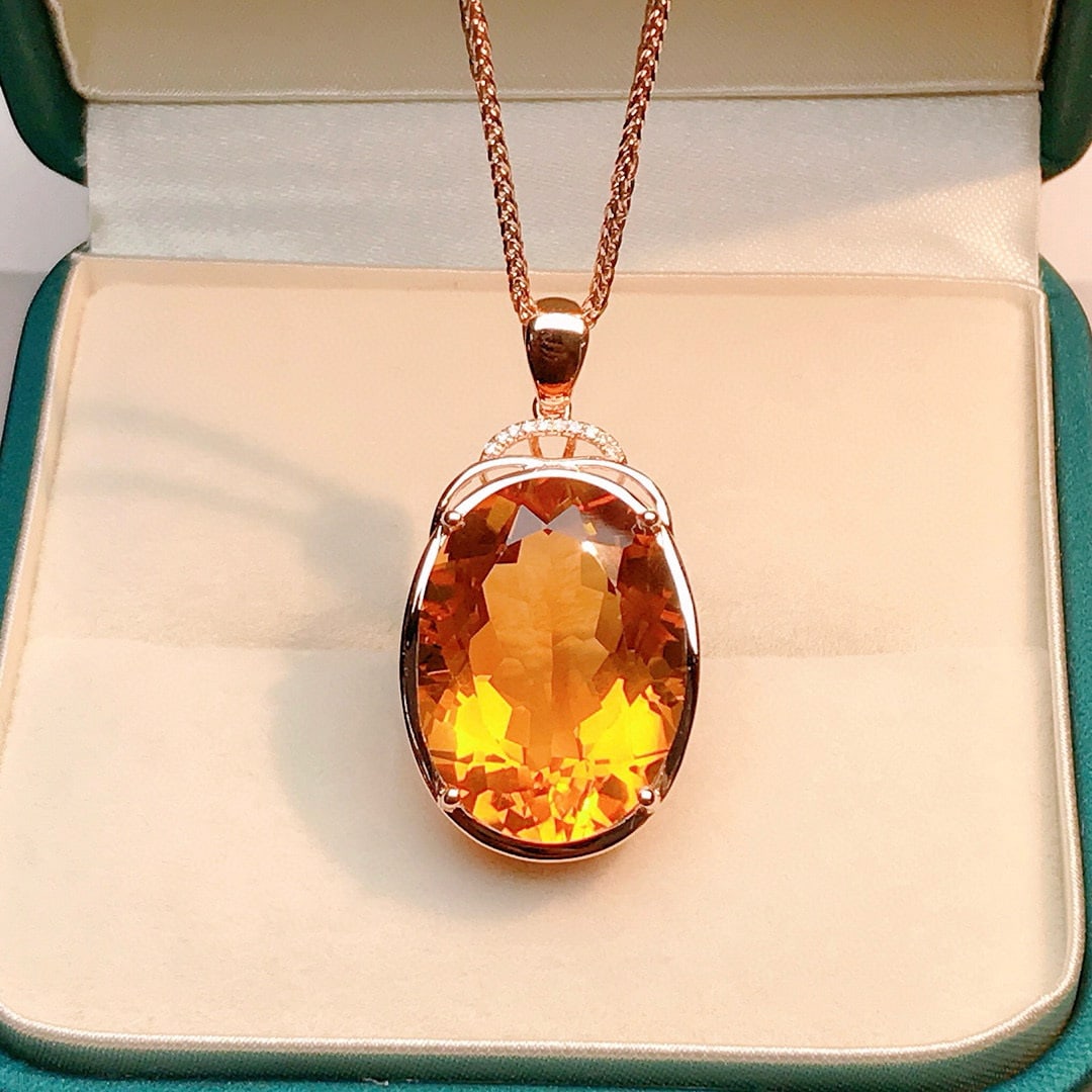 14k Gold 17.08 Ctw Natural Citrine & Diamond Pendant( Without Chain ): Ref:230958033 // gold content:14k gold // main gemstone:citrine // shape:oval // carat weight:17. 05ct // color:yellow // treatment:natural // // adjacent gemstone 2 : diamond // number of stones:10 /