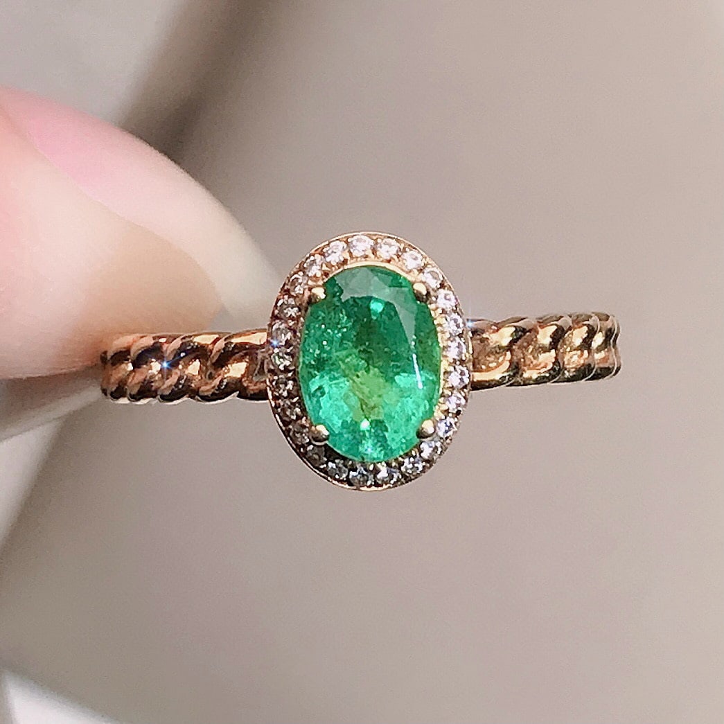 14k Gold 0.85 Ctw Natural Emerald & Diamond Ring: Ref:230958038 // gold content:14k gold // ring size:7. 25us // // main gemstone:emerald // shape:oval // carat weight:0. 78ct // color:green // treatment:natural // // adjacent gemstone 2 :