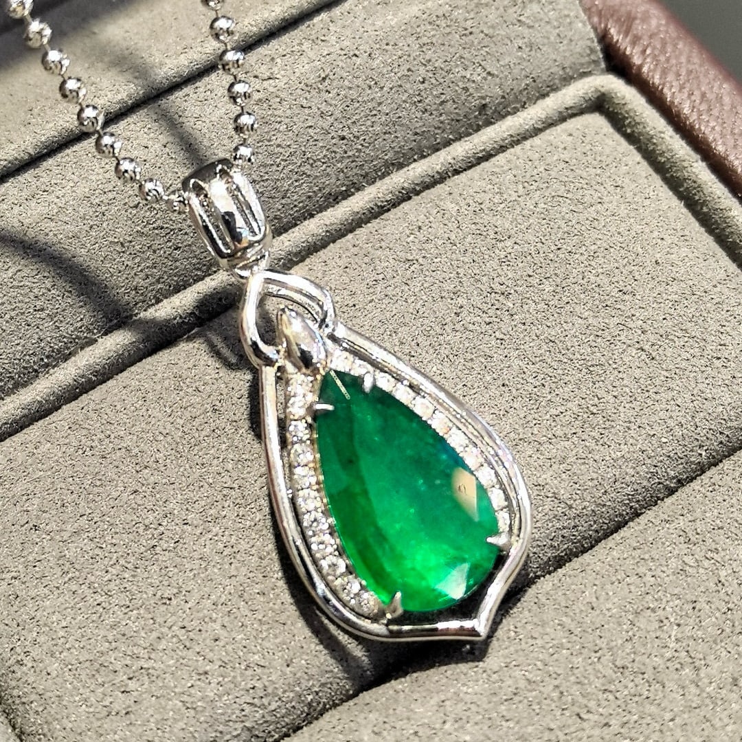 14k Gold 3.39 Ctw Vivid Green Natural Emerald & Diamond Pendant( Without Chain ): Ref:230958065 // gold content:14k gold // main gemstone:emerald // shape:pear // carat weight:3. 14ct // color:vivid green // treatment:natural // // adjacent gemstone 2 : diamond // shape:round //