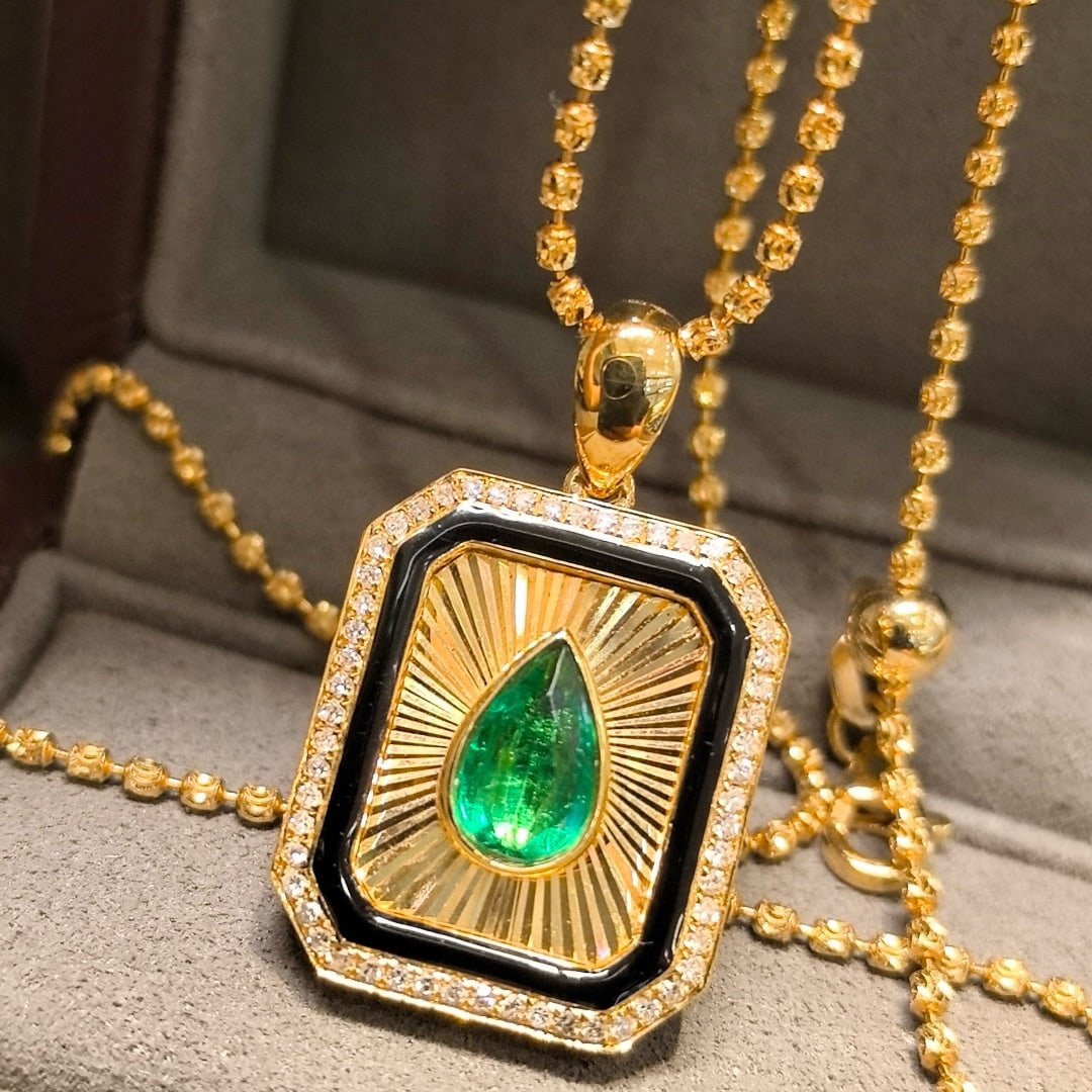 14k Gold 1.28 Ctw Vivid Green Natural Emerald & Diamond Pendant( Without Chain ): Ref:230958088 // gold content:14k gold // main gemstone:emerald // shape:pear // carat weight:1ct // color:vivid green // treatment:natural // // adjacent gemstone 2 : diamond // shape:round //