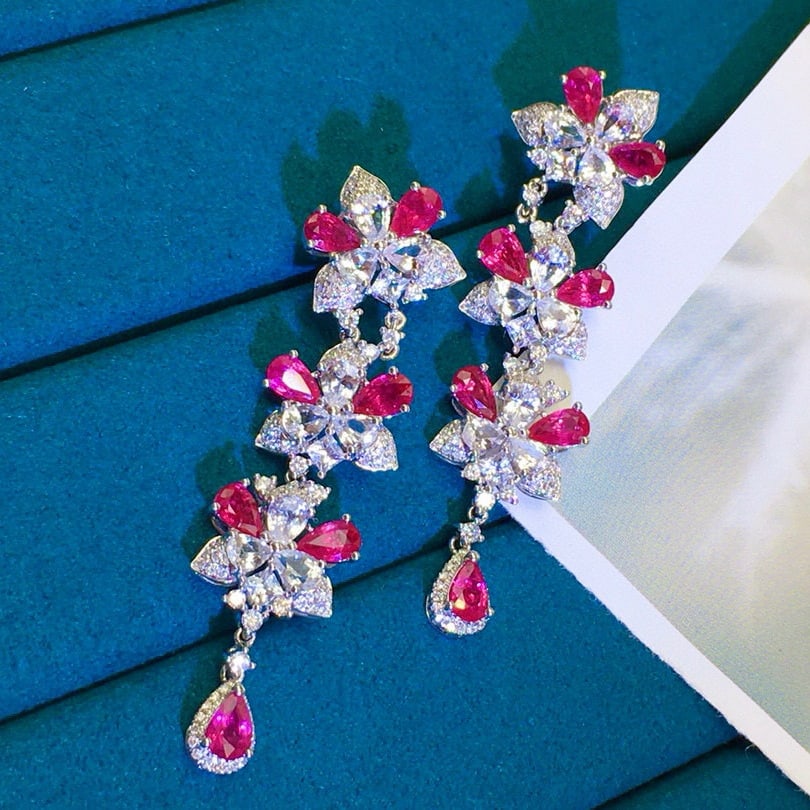 14k Gold 7.05 Ctw Natural Ruby & Sapphire Earrings: Ref:230958090 // gold content:14k gold // main gemstone:ruby // shape:pear // carat weight:3. 55ct // color:red // treatment:natural // // adjacent gemstone 2 : sapphire // shape:multiply // carat