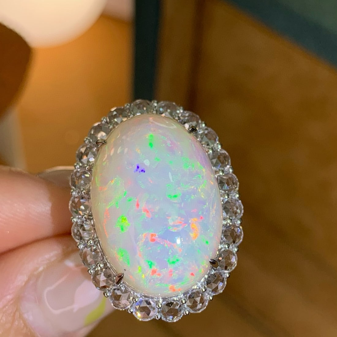 14k Gold 21.44 Ctw Natural Opal & Sapphire Ring: Ref:230958095 // gold content:14k gold // ring size:7. 25us // // main gemstone:opal // shape:oval // carat weight:18. 82ct // color:white // treatment:natural // // adjacent gemstone 2 : sapphire