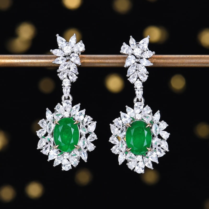 14k Gold 5.28 Ctw Vivid Green Natural Emerald & Sapphire Earrings: Ref:230958130 // gold content:14k gold // main gemstone:emerald // shape:oval // carat weight:2. 38ct // color:vivid green // treatment:natural // // adjacent gemstone 2 : sapphire // number of stones