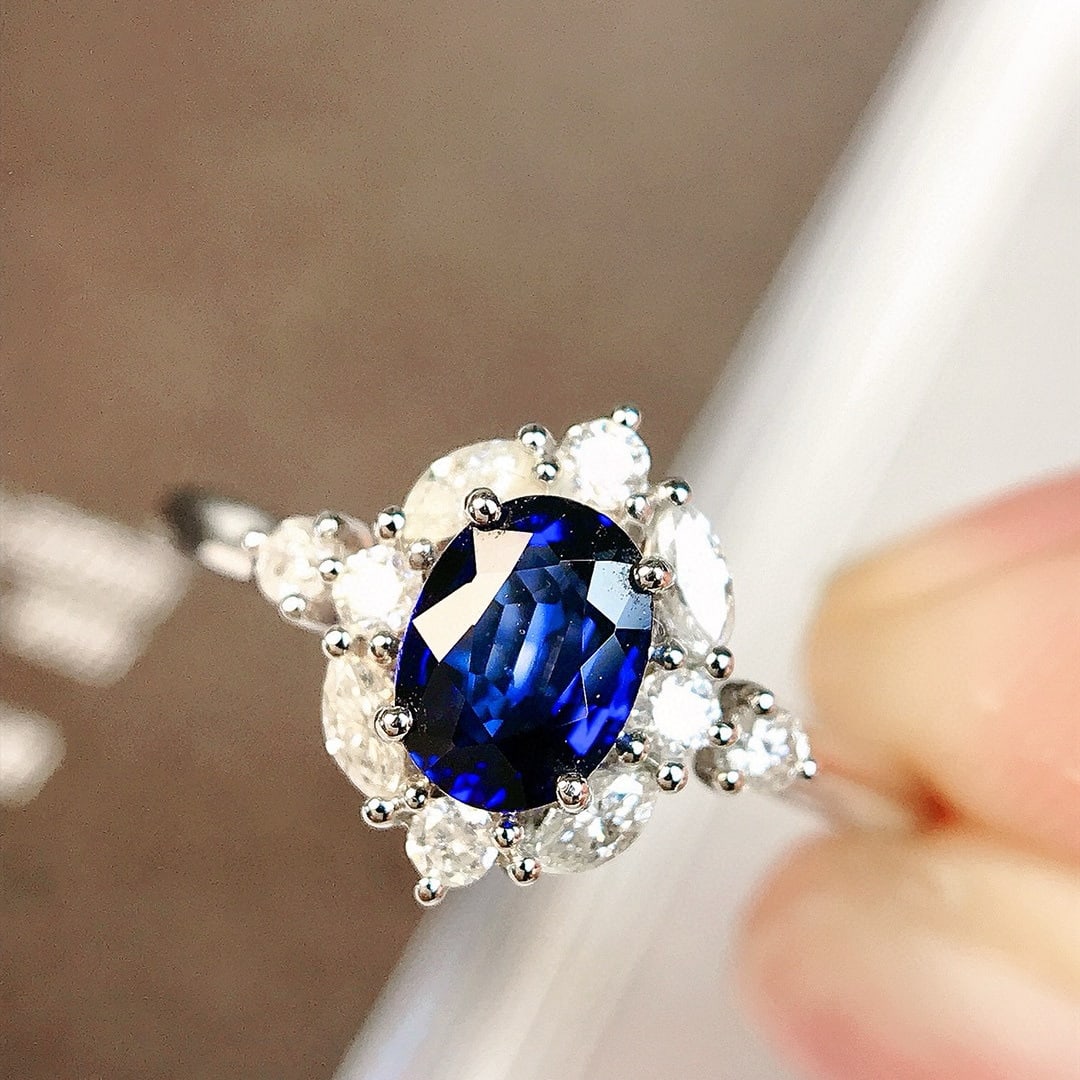 14k Gold 0.83 Ctw Natural Sapphire & Diamond Ring: Ref:230958165 // gold content:14k gold // ring size:7. 25us // // main gemstone:sapphire // shape:oval // carat weight:0. 58ct // color:blue // treatment:natural // // adjacent gemstone 2 : diamond //