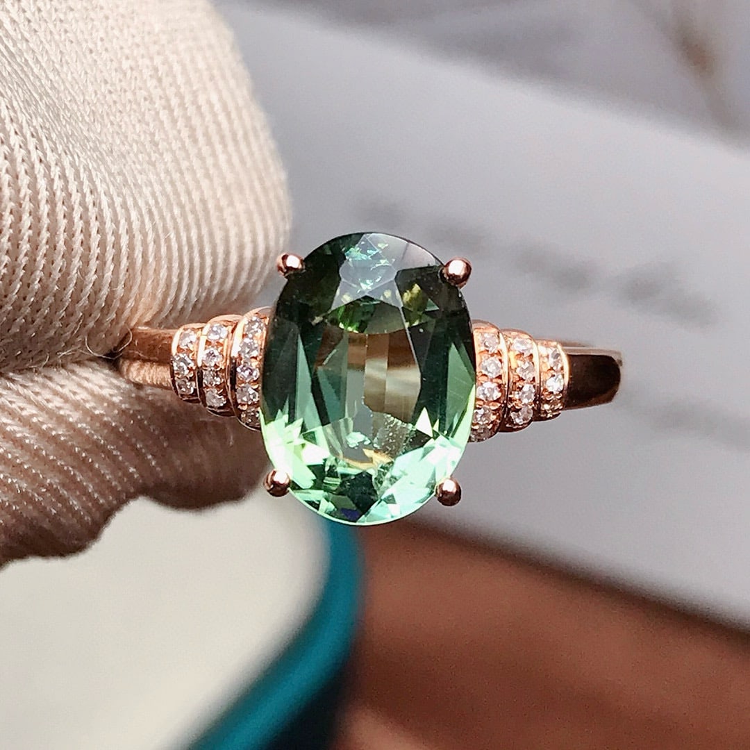 14k Gold 1.85 Ct Natural Tourmaline & Diamond Ring: Ref:230958282 // gold content:14k gold // ring size:7. 25us // // main gemstone:tourmaline // shape:oval // carat weight:1. 85ct // color:green // treatment:natural // // adjacent gemstone 2 :