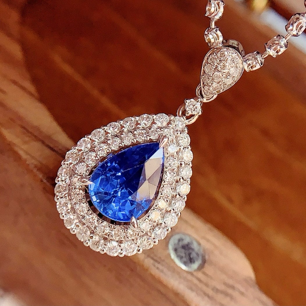 14k Gold 1.45 Ct Natural Sapphire & Diamond Pendant( Without Chain ): Ref:230958376 // gold content:14k gold // main gemstone:sapphire // shape:pear // carat weight:1. 45ct // color:blue // treatment:natural // // adjacent gemstone 2 : diamond // number of stones:56 //