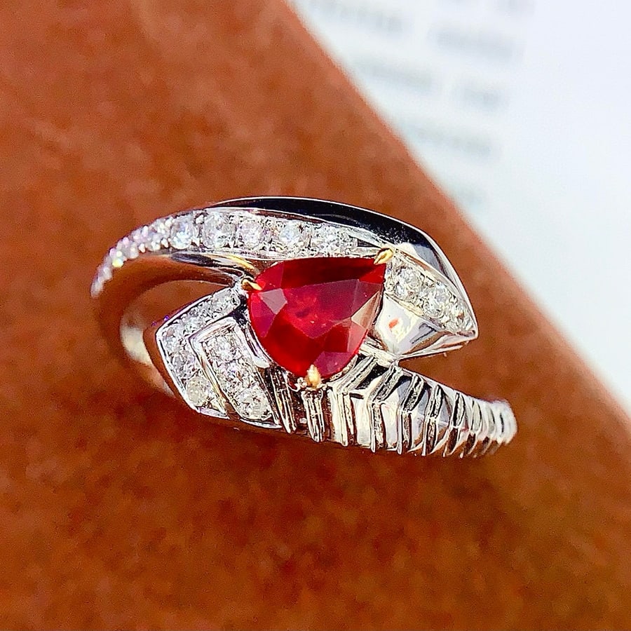 14k Gold 0.68 Ct Vivid Red Natural Ruby & Diamond Ring: Ref:230958440 // gold content:14k gold // ring size:7. 25us // // main gemstone:ruby // shape:pear // carat weight:0. 68ct // color:vivid red // treatment:natural // // adjacent gemstone 2 :