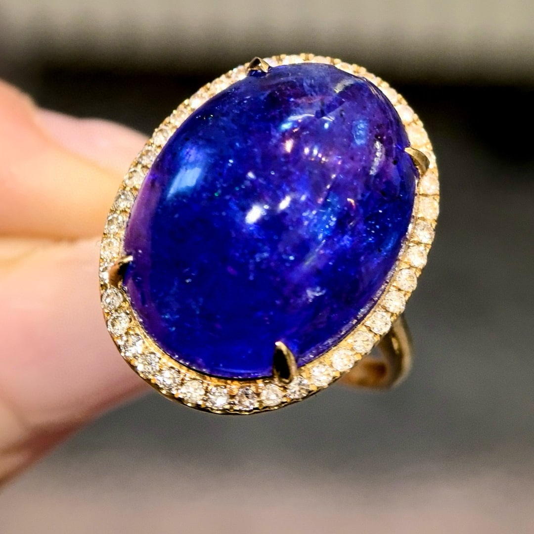 14k Gold 21.62 Ctw Natural Tanzanite & Diamond Ring: Ref:230958449 // gold content:14k gold // ring size:7. 25us // // main gemstone:tanzanite // shape:oval // carat weight:21. 3ct // color:blue // treatment:natural // // adjacent gemstone 2 : diamond /