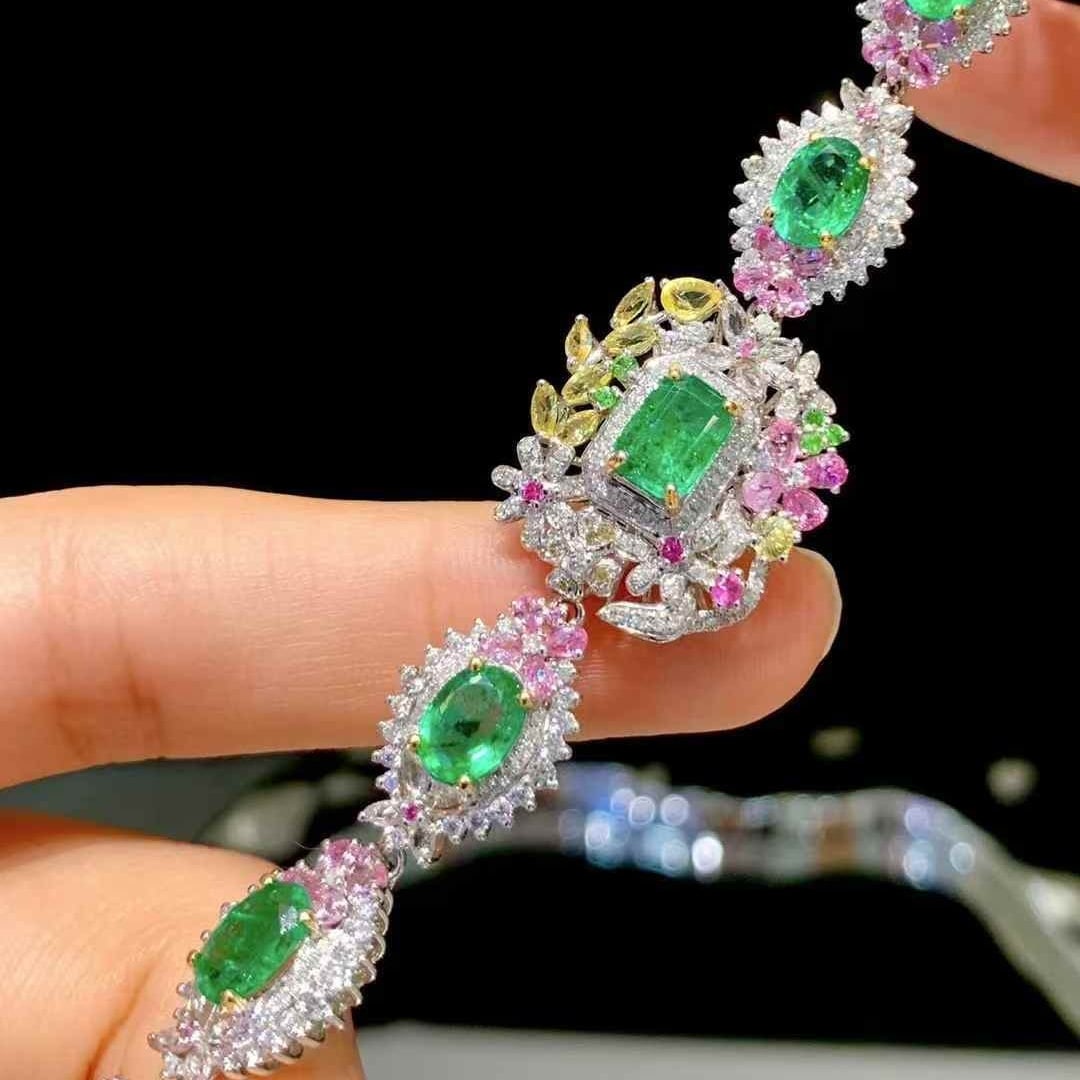 14k Gold 5.5 Ct Natural Emerald & Diamond & Sapphire Bracelet: Ref:231059022 // gold content:14k gold // main gemstone:emerald // shape:multiple // carat weight:5. 5ct // color:green // treatment:natural // // adjacent gemstone 2 : diamond // shape:round //