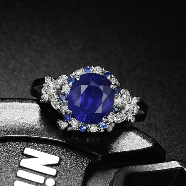 14k Gold 2.37 Ctw Vivid Blue Natural Sapphire & Diamond Ring: Ref:231059071 // gold content:14k gold // ring size:7. 25us // // main gemstone:sapphire // shape:oval // carat weight:2. 12ct // color:vivid blue // treatment:natural // // adjacent gemstone 2 :