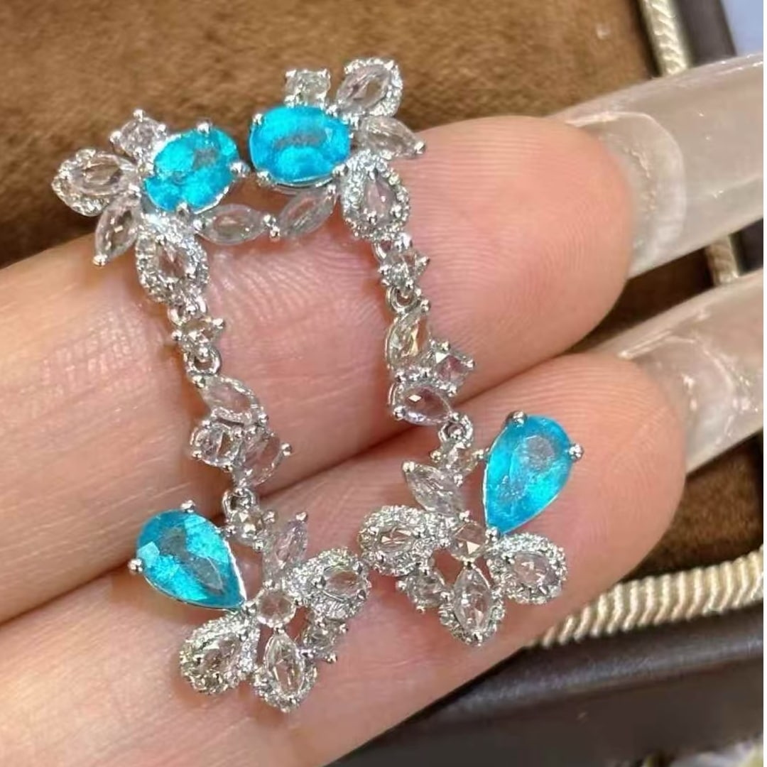 14k Gold 1.15 Ct Natural Paraiba Tourmaline & Diamond & Sapphire Earrings: Ref:231059090 // gold content:14k gold // main gemstone:paraiba tourmaline // shape:multiple // carat weight:1. 15ct // color:blue // treatment:natural // // adjacent gemstone 2 : diamond // shape:rou