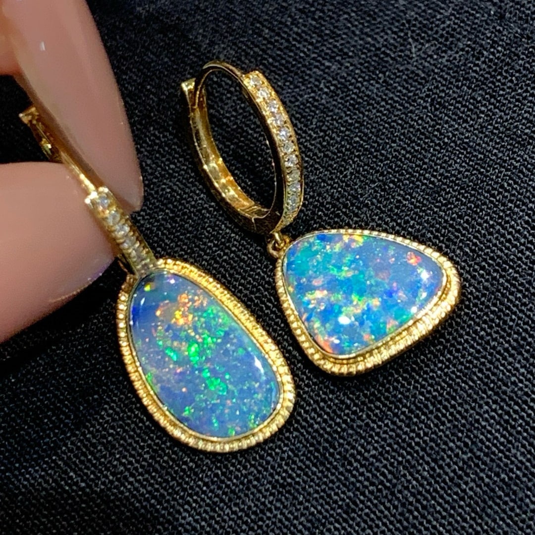 14k Gold 2.55 Ctw Natural Opal & Diamond Earrings: Ref:231059117 // gold content:14k gold // main gemstone:opal // shape:other // carat weight:2. 47ct // color:color // treatment:natural // // adjacent gemstone 2 : diamond // shape:round // carat