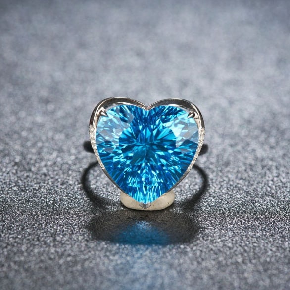 14k Gold 14.8 Ct Natural Topaz & Diamond Ring: Ref:231059132 // gold content:14k gold // ring size:7. 25us // // main gemstone:topaz // shape:heart // carat weight:14. 8ct // color:blue // treatment:natural // // adjacent gemstone 2 : diamond