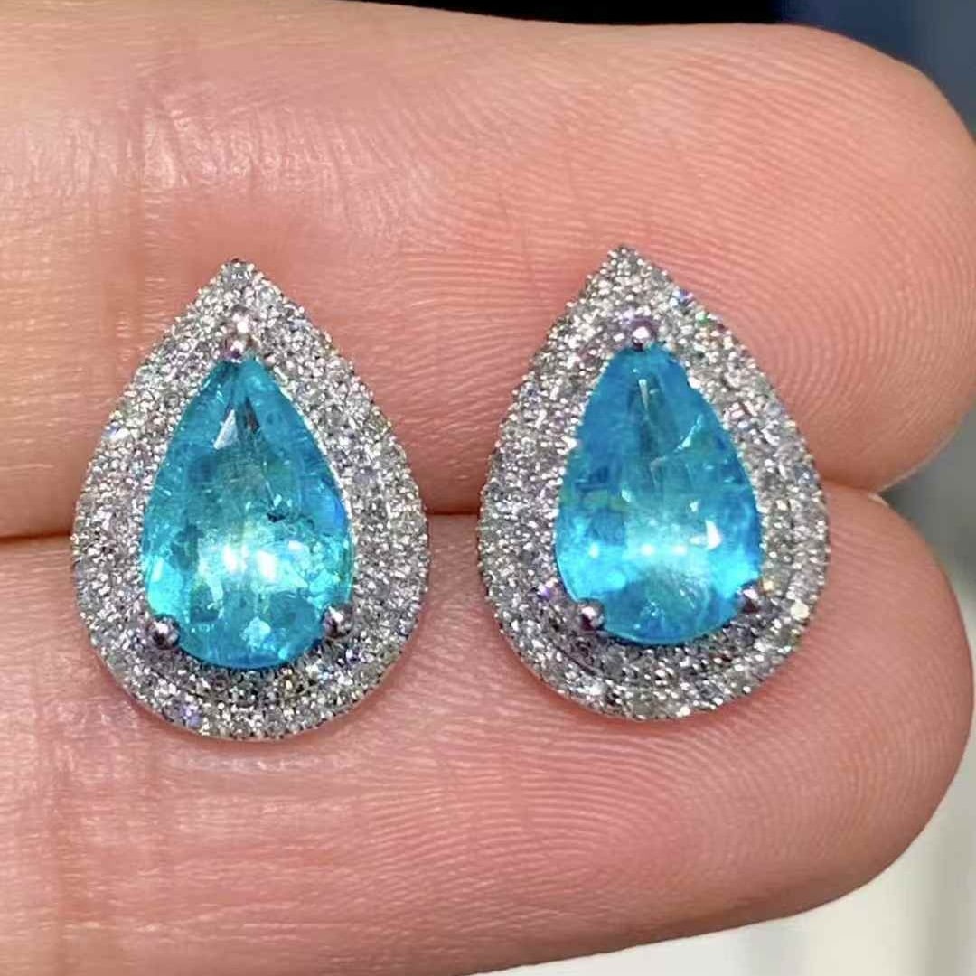 14k Gold 1.6 Ct Natural Paraiba Tourmaline & Diamond Earrings: Ref:231059135 // gold content:14k gold // main gemstone:paraiba tourmaline // shape:pear // carat weight:1. 6ct // color:blue // treatment:natural // // adjacent gemstone 2 : diamond // shape:round //