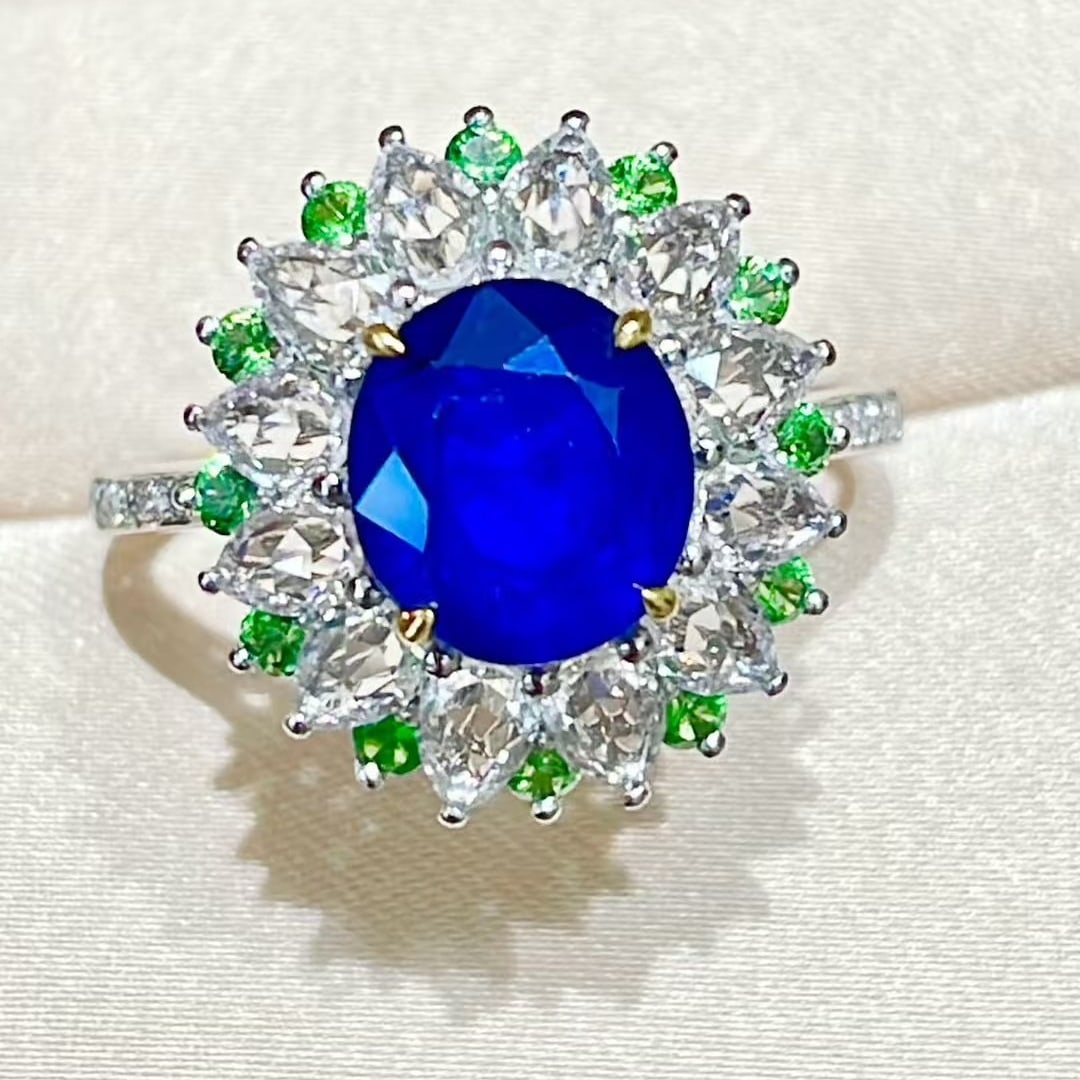 14k Gold 2.48 Ct Vivid Blue Natural Sapphire & Diamond Ring: Ref:231059202 // gold content:14k gold // ring size:7. 25us // // main gemstone:sapphire // shape:oval // carat weight:2. 48ct // color:vivid blue // treatment:natural // // adjacent gemstone 2 :