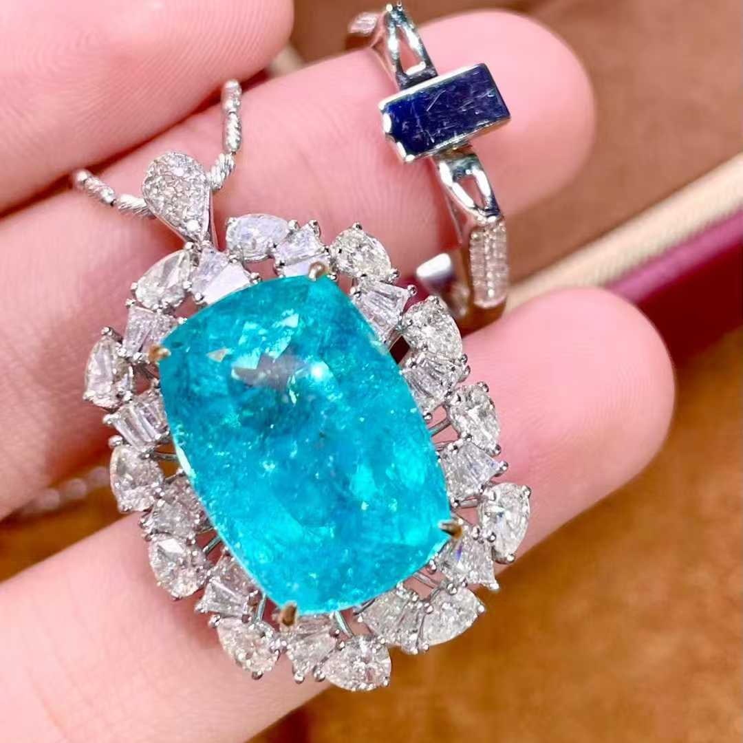 14k Gold 14.47 Ctw Natural Paraiba Tourmaline & Diamond Ring/pendant( Without Chain ): Ref:231059220 // gold content:14k gold // ring size:7. 25us // // main gemstone:paraiba tourmaline // shape:cushion // carat weight:12. 81ct // color:blue // treatment:natural // // adjacent gemstone
