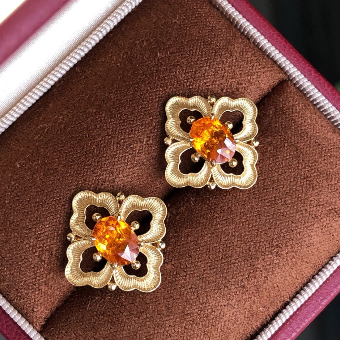 14k Gold 2.88 Ct Natural Spessartine Earrings: Ref:231060067 // gold content:14k gold // main gemstone:spessartine // shape:oval // carat weight:2. 88ct // color:orange // treatment:natural // Condition: NewLow Estimate: 7000.00High Estimate: