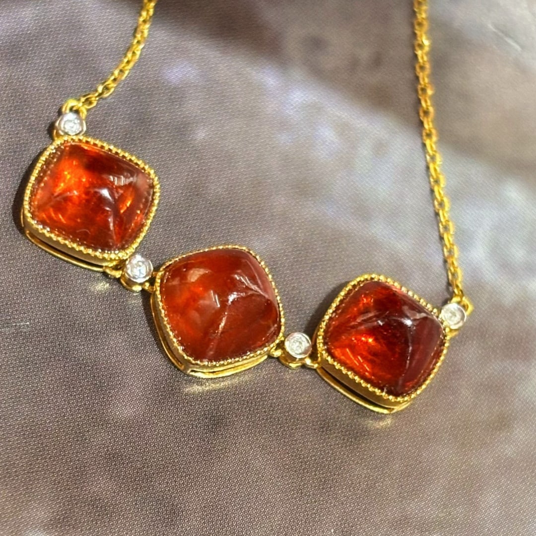 14k Gold 8 Ct Natural Spessartine & Diamond Bracelet: Ref:231060088 // gold content:14k gold // main gemstone:spessartine // shape:sugar-loaf // carat weight:8ct // color:orange // treatment:natural // // adjacent gemstone 2 : diamond // shape:round