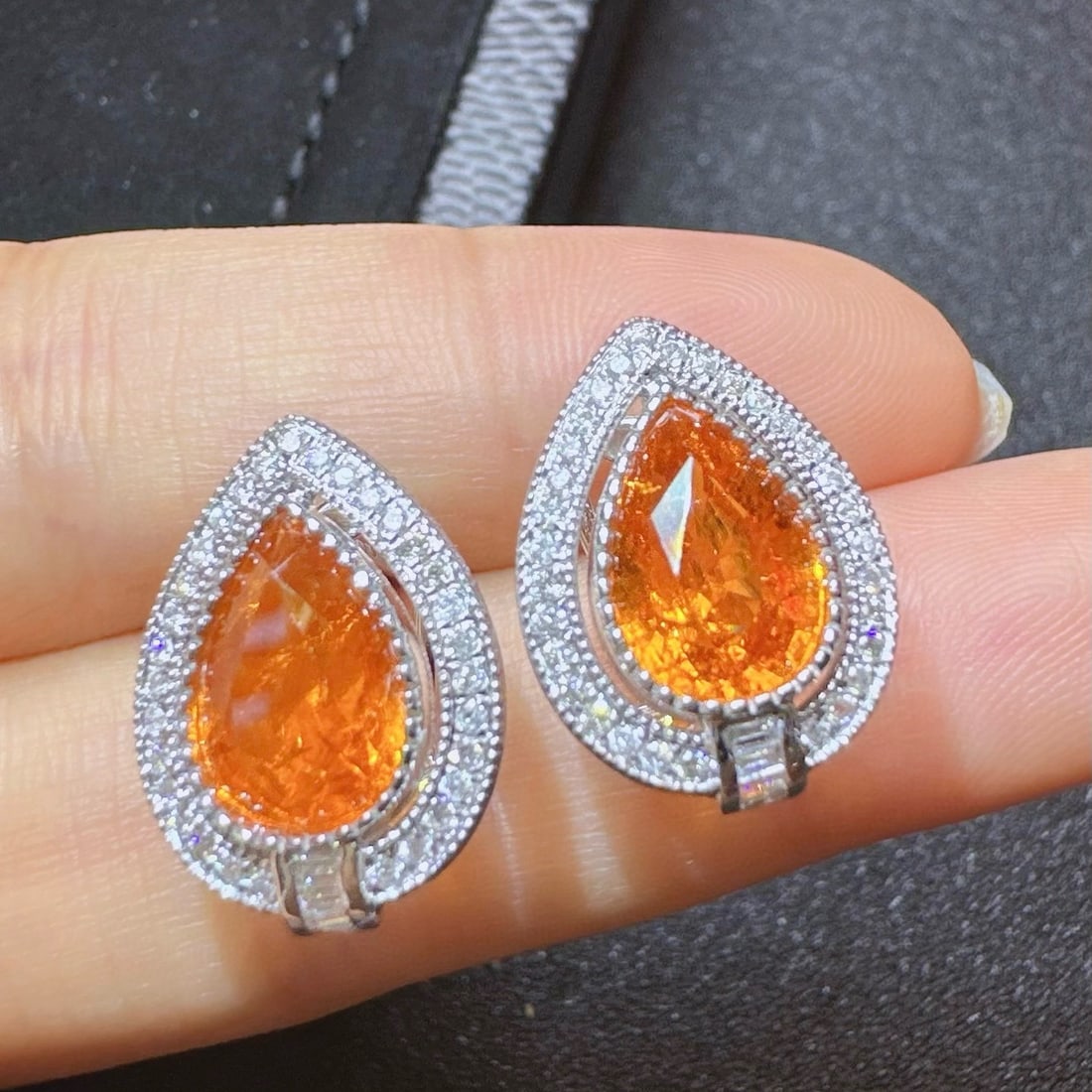 14k Gold 6.50 Ctw Natural Spessartine & Diamond Earrings: Ref:231060100 // gold content:14k gold // main gemstone:spessartine // shape:pear // carat weight:6. 12ct // color:orange // treatment:natural // // adjacent gemstone 2 : diamond // shape:multiply