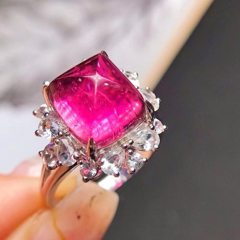 14k Gold 5.75 Ct Natural Tourmaline & Sapphire Ring: Ref:231060128 // gold content:14k gold // ring size:7. 25us // // main gemstone:tourmaline // shape:sugar-loaf // carat weight:5. 75ct // color:red // treatment:natural // // adjacent gemstone 2 :