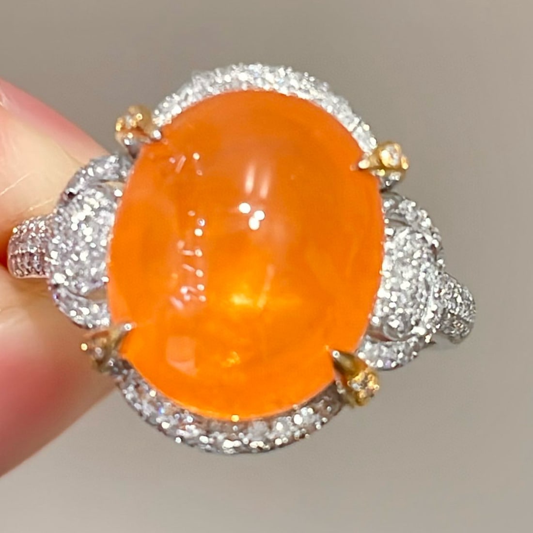 14k Gold 9.32 Ct Natural Spessartine & Diamond Ring: Ref:231060155 // gold content:14k gold // ring size:7. 25us // // main gemstone:spessartine // shape:oval // carat weight:9. 32ct // color:orange // treatment:natural // // adjacent gemstone 2 :