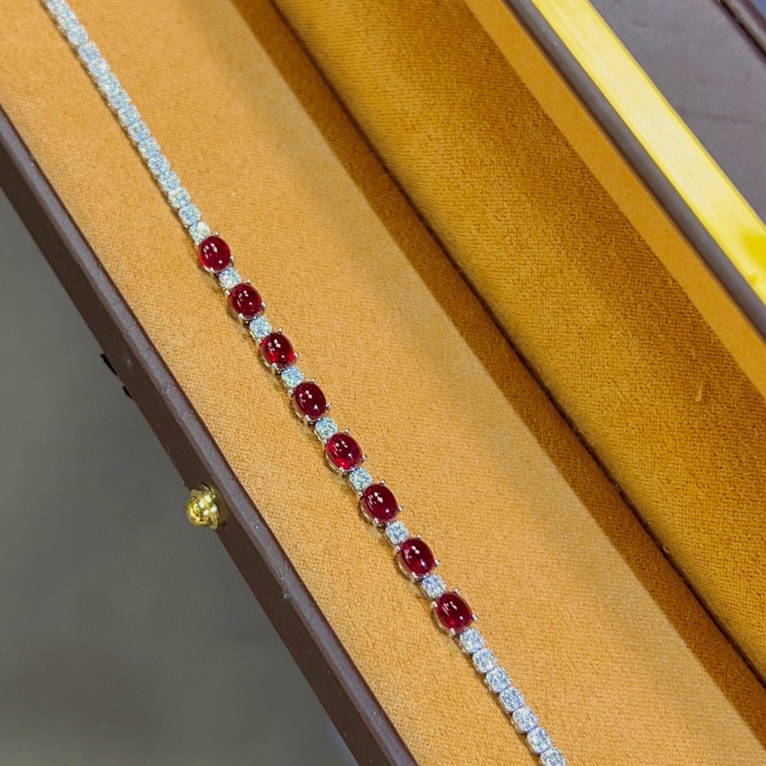 14k Gold 5.67 Ctw Natural Ruby & Diamond Bracelet: Ref:231060161 // gold content:14k gold // main gemstone:ruby // shape:oval // carat weight:5. 15ct // color:pigeonblood red // treatment:natural // // adjacent gemstone 2 : diamond // shape:round