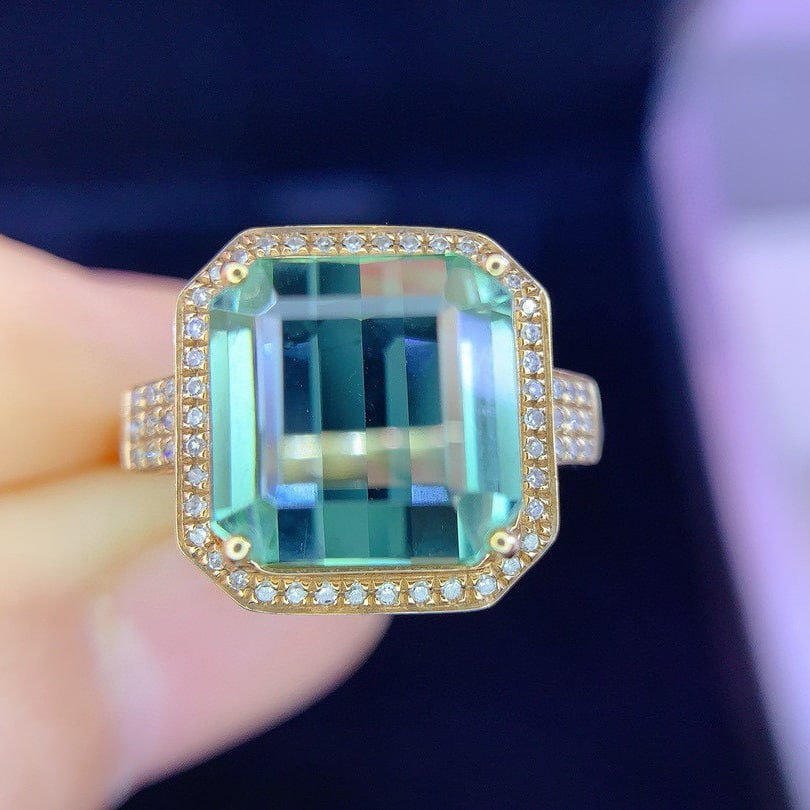 14k Gold 6.8 Ct Natural Tourmaline & Diamond Ring: Ref:231060191 // gold content:14k gold // ring size:7. 25us // // main gemstone:tourmaline // shape:octagonal // carat weight:6. 8ct // color:green // treatment:natural // // adjacent gemstone 2 :