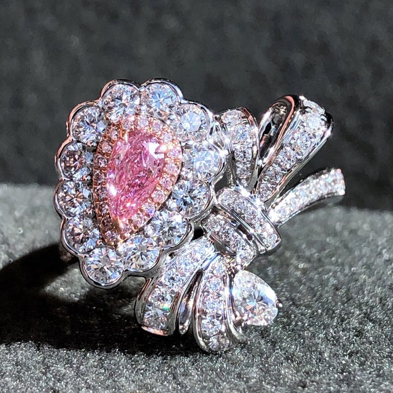 14k Gold 1.15 Ctw Natural Pink Diamond & Diamond Ring: Ref:231060259 // gold content:14k gold // ring size:7. 25us // // main gemstone:pink diamond // shape:pear // carat weight:0. 25ct // clarity grade:i2 // color:pink // treatment:natural // //