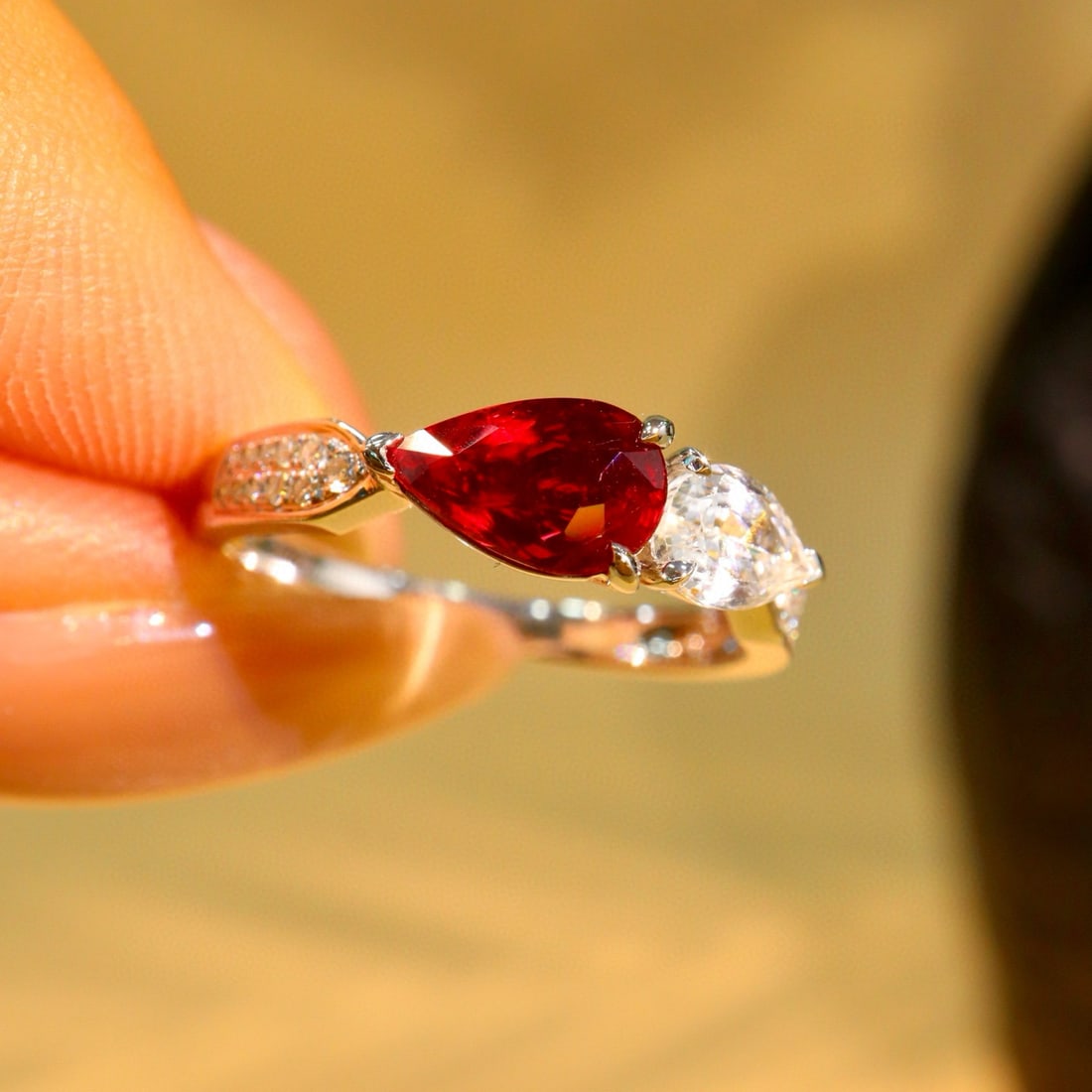 14k Gold 1.77 Ctw Natural Ruby & Sapphire Ring: Ref:231060343 // gold content:14k gold // ring size:7. 25us // // main gemstone:ruby // shape:pear // carat weight:1. 20ct // color:pigeonblood red // treatment:natural // // adjacent gemstone 2 :