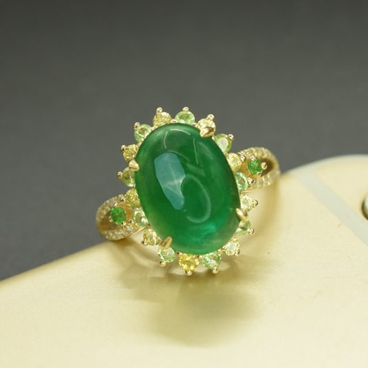 14k Gold 5.24 Ctw Natural Emerald & Tsavorite Ring: Ref:231061002 // gold content:14k gold // ring size:7. 25us // // main gemstone:emerald // shape:oval // carat weight:5. 02ct // color:green // treatment:natural // // adjacent gemstone 2 :