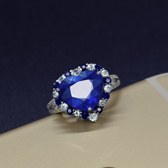 14k Gold 4.31 Ctw Natural Sapphire & Diamond Ring: Ref:231061025 // gold content:14k gold // ring size:7. 25us // // main gemstone:sapphire // shape:heart // carat weight:3. 7ct // color:blue // treatment:natural // // adjacent gemstone 2 :