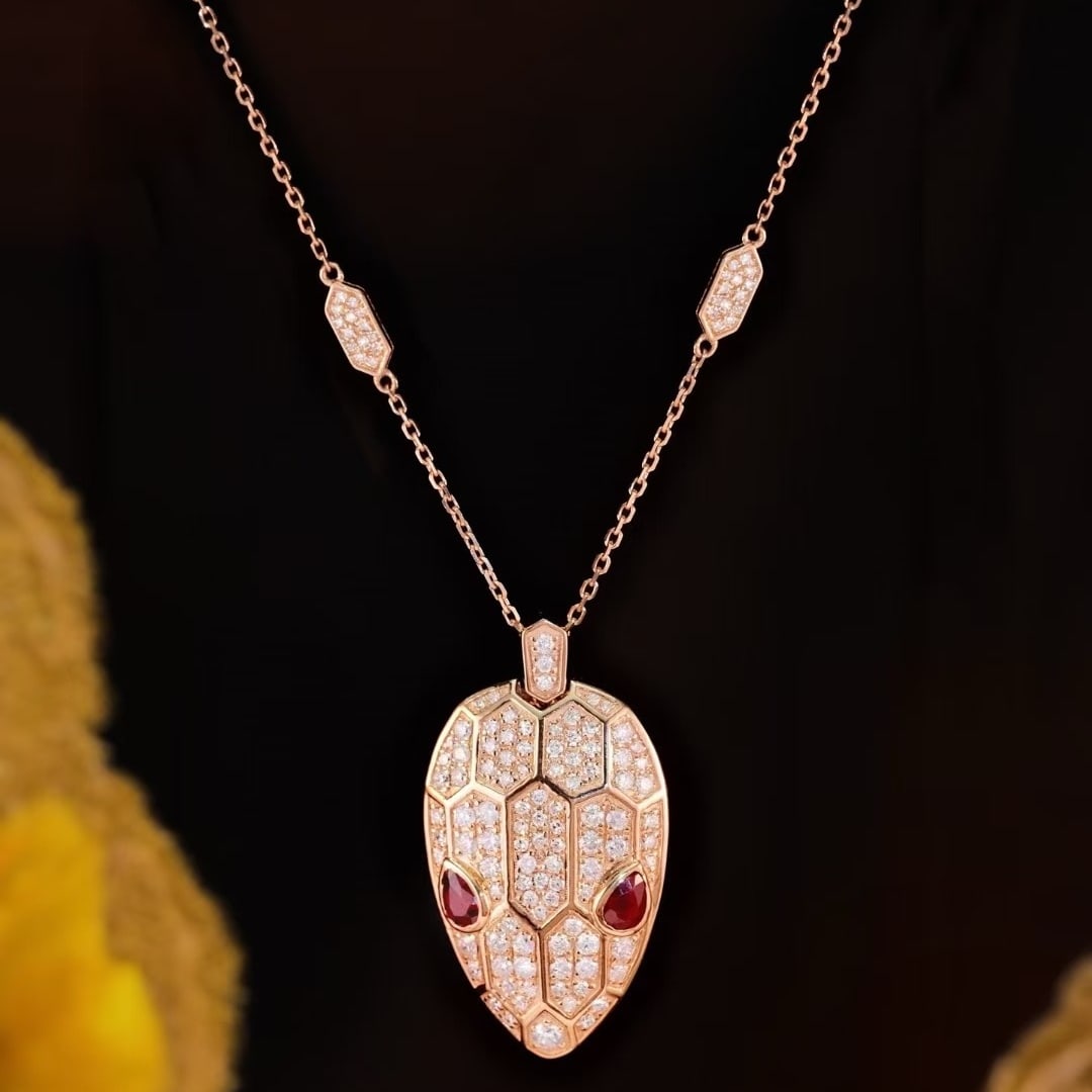 14k Gold 1.76 Ctw Natural Ruby & Diamond Necklace: Ref:231061082 // gold content:14k gold // main gemstone:ruby // shape:pear // carat weight:0. 56ct // color:red // treatment:natural // // adjacent gemstone 2 : diamond // shape:round // carat