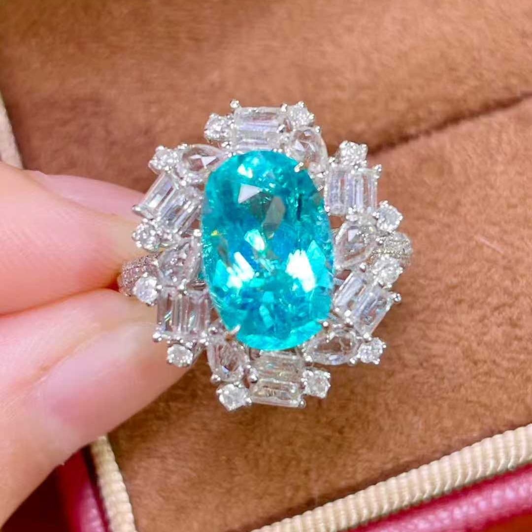 14k Gold 4.50 Ctw Natural Paraiba Tourmaline & Diamond & Sapphire Ring: Ref:231061095 // gold content:14k gold // ring size:7. 25us // // main gemstone:paraiba tourmaline // shape:oval // carat weight:3. 44ct // color:neon blue // treatment:natural // // adjacent gemstone