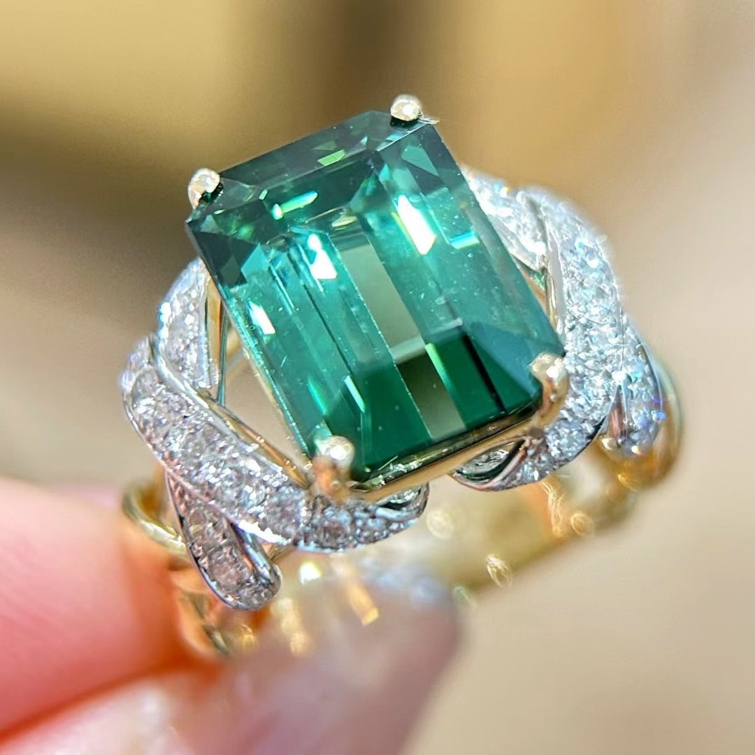 14k Gold 8.45 Ctw Natural Tourmaline & Diamond Ring: Ref:231061098 // gold content:14k gold // ring size:7. 25us // // main gemstone:tourmaline // shape:octagonal // carat weight:7. 7ct // color:green // treatment:natural // // adjacent gemstone 2 :