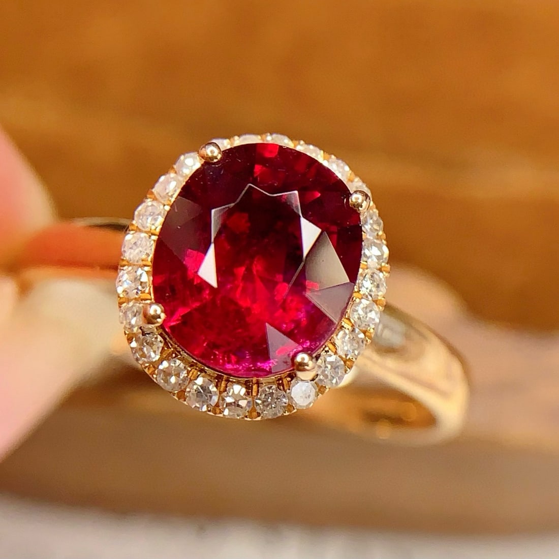 14k Gold 2.35 Ct Natural Tourmaline & Diamond Ring: Ref:231061100 // gold content:14k gold // ring size:7. 25us // // main gemstone:tourmaline // shape:oval // carat weight:2. 35ct // color:red // treatment:natural // // adjacent gemstone 2 :
